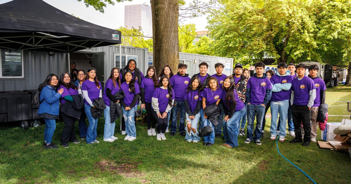 a group of volunteers posing for a photo